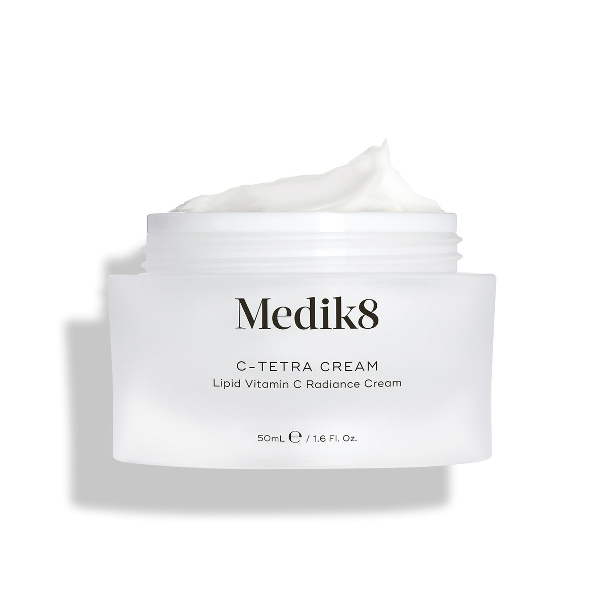 Medik8's C-Tetra® Cream, labeled Lipid Vitamin C Radiance Cream (50ml / 1.6 fl. oz.), features a white cream enriched with vitamin C and hyaluronic acid to nourish and hydrate skin for a radiant glow.