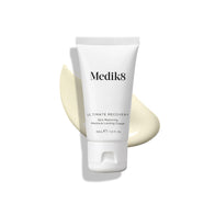 A 30ml white tube of Medik8 Ultimate Recovery™ cream rests on a cream smear against a white background, designed to restore compromised skin to its optimal state.