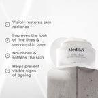 The Medik8 C-Tetra® Cream rests on concrete, showcasing its promise to restore skin radiance and improve fine lines. Enriched with vitamin C, it nourishes skin while combating signs of aging.