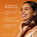 A woman smiles while holding Medik8's C-Tetra® Luxe, a skincare serum infused with Vitamin C, promising a healthy glow after one use, reduced wrinkles and hyperpigmentation, and a strengthened skin barrier.