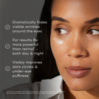 A woman uses Medik8's r-Retinoate® Day & Night Eye Serum, highlighting its benefits: it reduces fine lines and wrinkles, is 8x stronger than standard retinol, and effectively improves dark circles and puffiness.