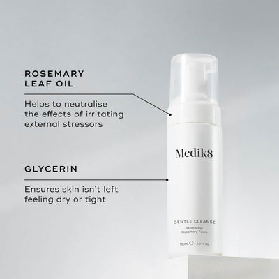 The white bottle of Medik8's Gentle Cleanse™ is a rosemary-infused hydrating foam ideal for sensitive skin, featuring a pH-balanced formula with rosemary leaf oil and glycerin.
