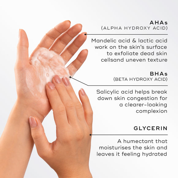 Two hands hold a dollop of Surface Radiance Cleanse™ by Medik8. Text highlights its AHA/BHA complex and glycerin for exfoliation, clearer skin, and hydration.