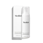A Medik8 Micellar Mousse™ cleanser, featuring micellar cleansing technology for efficient makeup removal, is placed in front of its white box, both clearly labeled with product details.