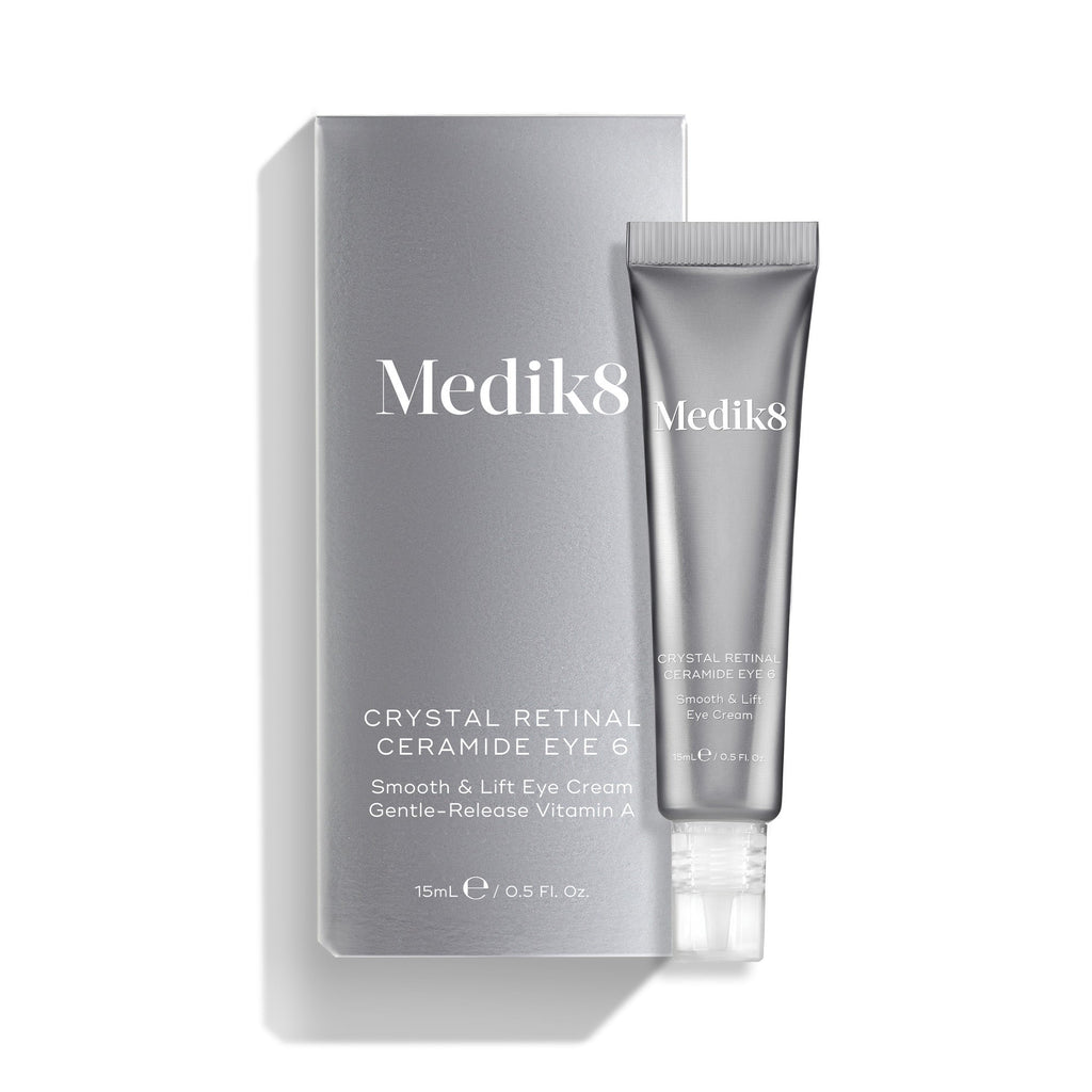 A 15ml tube and box of Medik8 Crystal Retinal® Ceramide Eye, a next-gen retinAL formula eye cream with gentle-release Vitamin A, ideal for smoothing, lifting, and achieving a youthful-looking eye area.