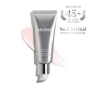 A silver tube of Medik8 Crystal Retinal®, the No.1 anti-ageing serum worldwide and winner of 45+ global awards, featuring a pink cream smear.
