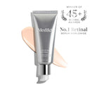 A silver tube of Medik8 Crystal Retinal®, the No.1 retinal and vitamin A night serum worldwide with 45+ global awards, alongside a product smear.