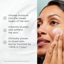 A person uses Medik8's Total Moisture Daily Facial Cream™, highlighting benefits: moisture infusion, microbiome support, plumping, softening, and a 30% boost in skin barrier function within an hour.