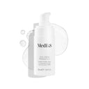A white bottle of Medik8 Cyprus Exo-PDRN Prismatic+ serum with a pump dispenser is shown on a white background, surrounded by clear liquid drops.