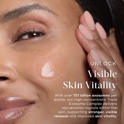 Close-up of a woman applying Exo-PDRN Prismatic+ by Medik8 Cyprus to her cheek, highlighting the skin vitality benefits of this exosome complex skincare product.