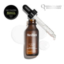 A brown bottle of Medik8 C-Tetra® Luxe serum with a dropper, liquid drops, an award badge, and "Dermatologist Recommended" text on a white background—formulated with vitamin C to enhance radiance and target fine lines.