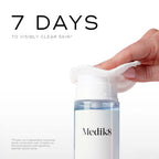 A hand uses a cotton pad to apply liquid from a Medik8 Press & Clear Refill™ bottle, featuring Salicylic Acid. The text claims "7 days to visibly clear skin," with study details provided below.