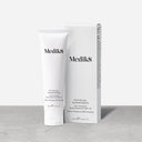 The Medik8 Physical Sunscreen™ tube and box sit on a surface, delivering broad-spectrum SPF 50 UVA/UVB protection with an anti-pollution formula. This 60 mL gem is water-resistant for up to 80 minutes.